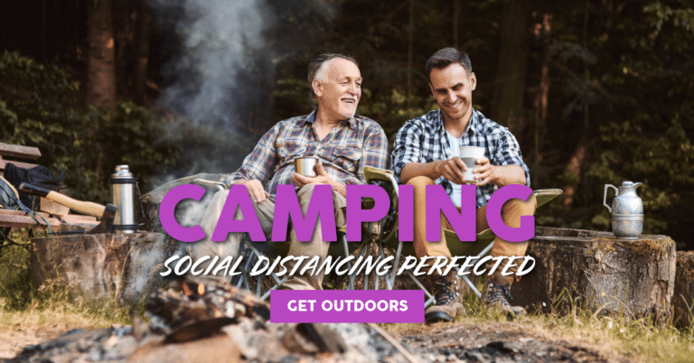 Two men sitting around a campfire, engaging in marketing discussions.