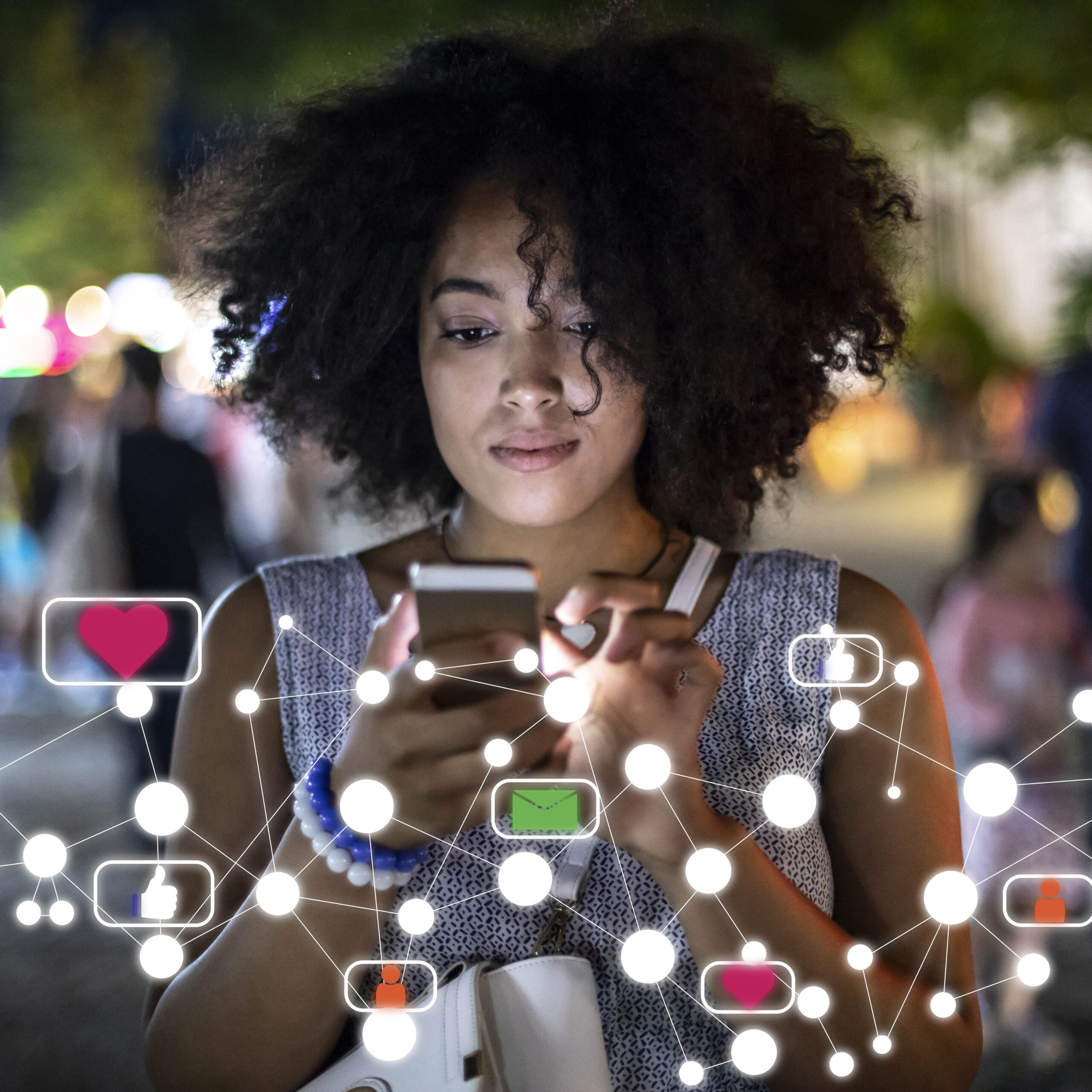 Woman using smartphone with social media icons.